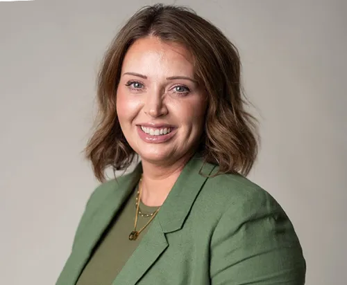 A woman with a smile on her face.