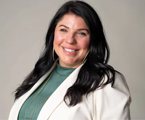 A woman with a smile on her face.