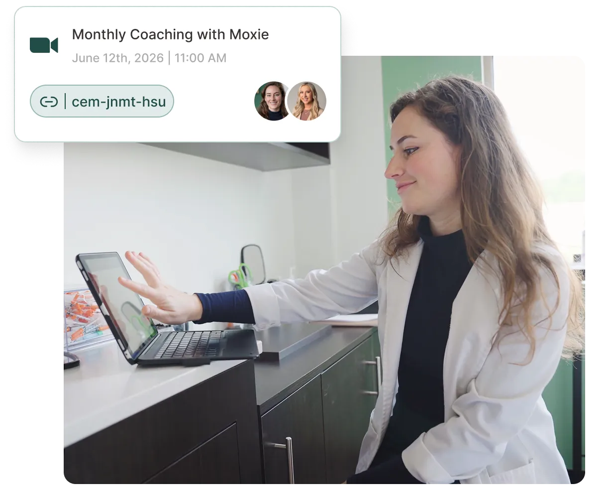 A woman standing in front of a white house.