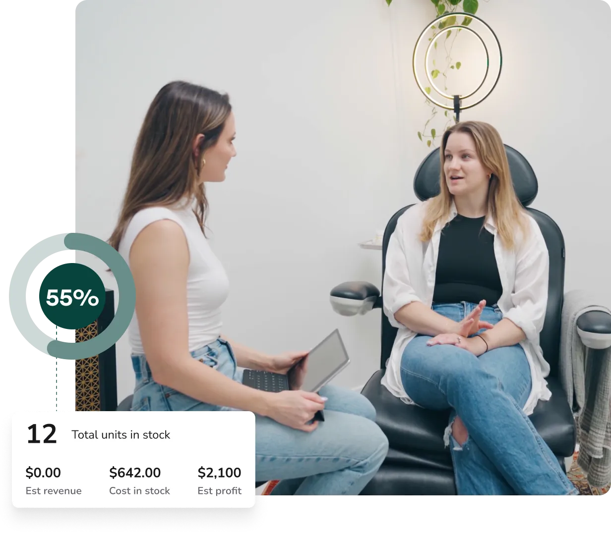 Two women sitting and talking in a bright room, one holding a tablet, with an overlaid graphic showing 55% and stock statistics.