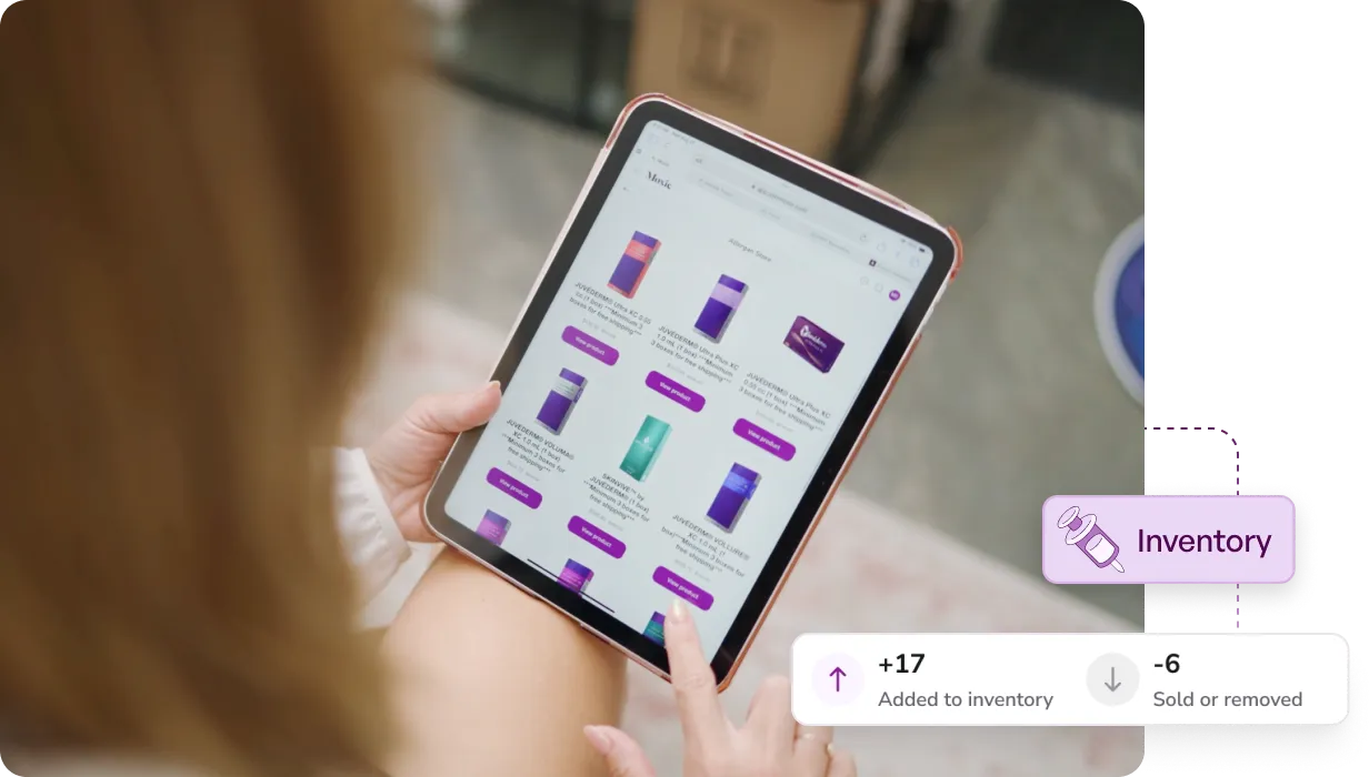 Person using a tablet to manage inventory, showing product listings and inventory changes with +17 added and -6 sold or removed.