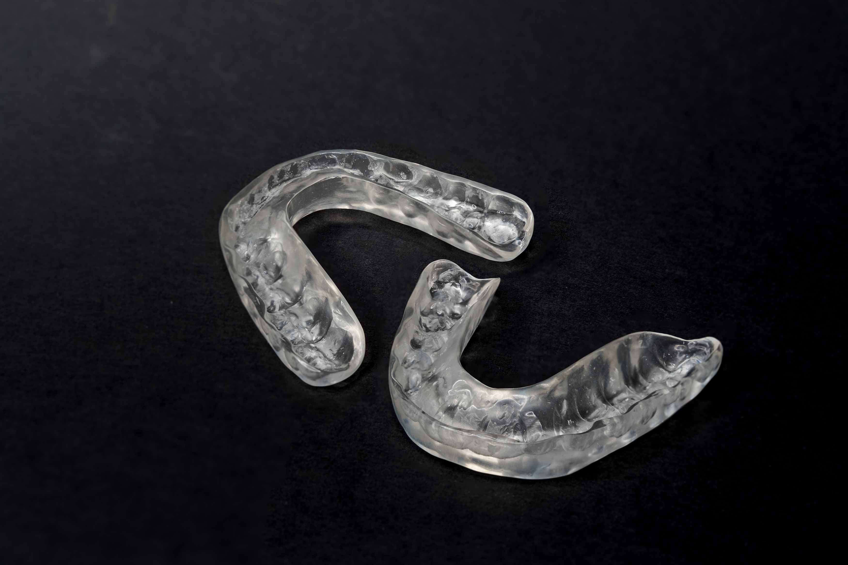 A photo of multiple occlusal splints or nightguards 
