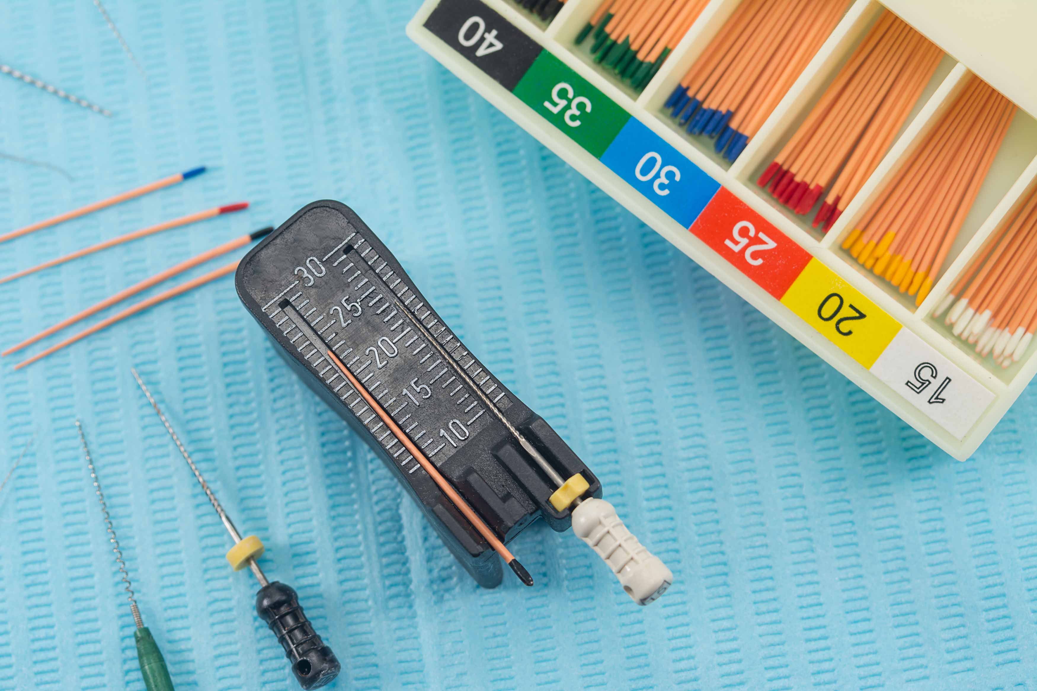 A photo taken of gutta-percha and root canal files that is used for root canal treatment