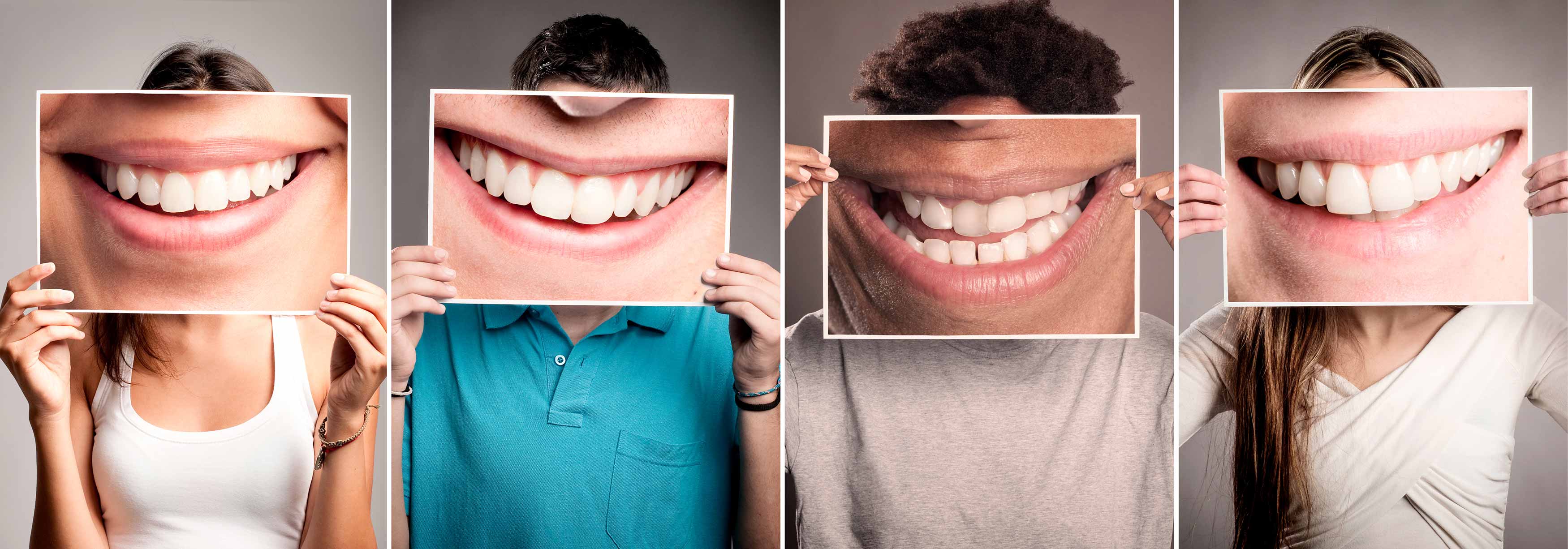 A photo of 4 people holding up 4 different photos of their smiles.