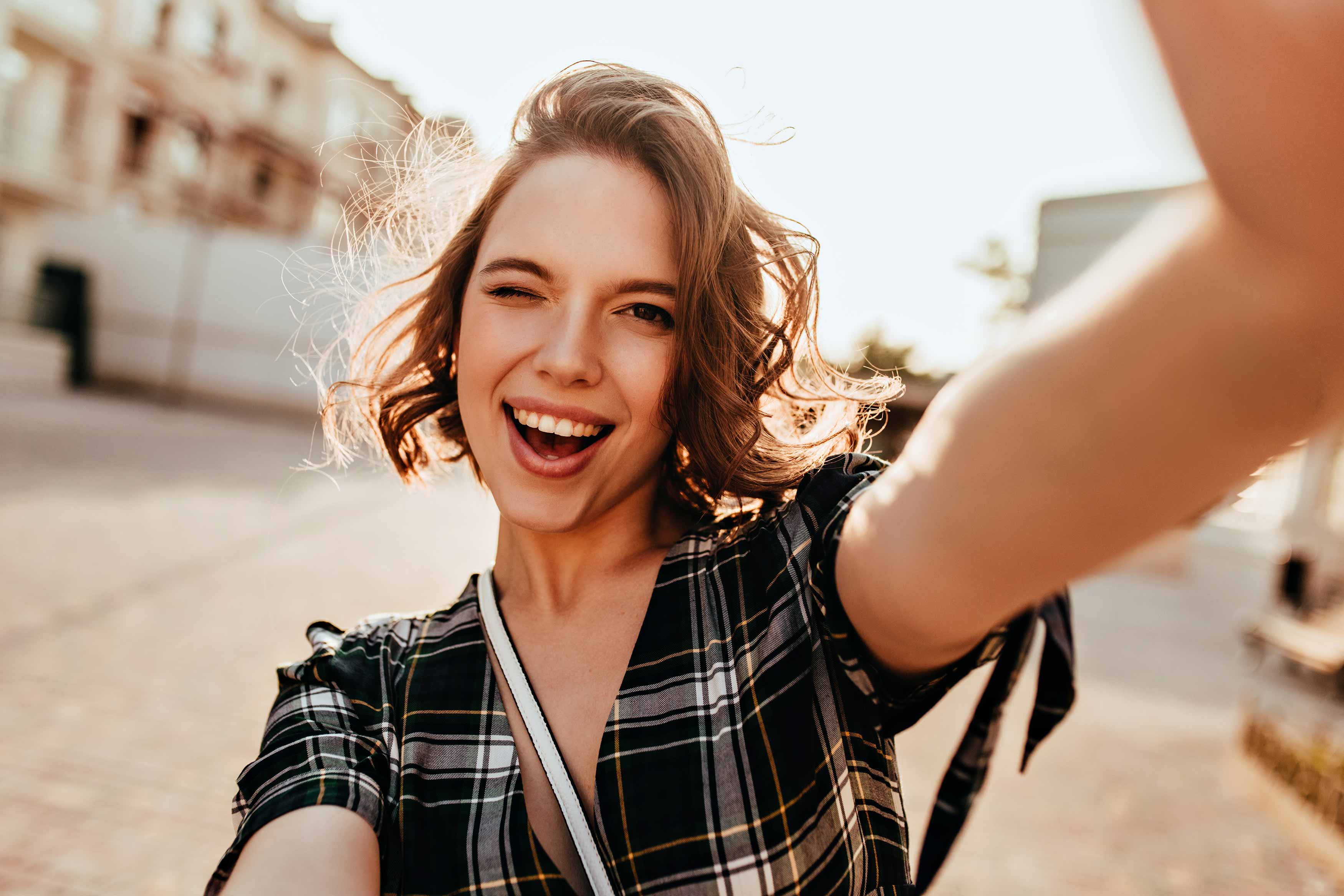 This photo shows a female smiling showing off her great teeth