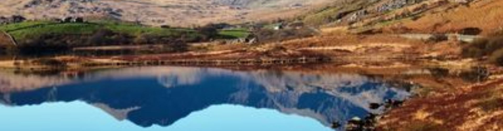 Mountains and lake in Snowdonia National Park, Wales, UK