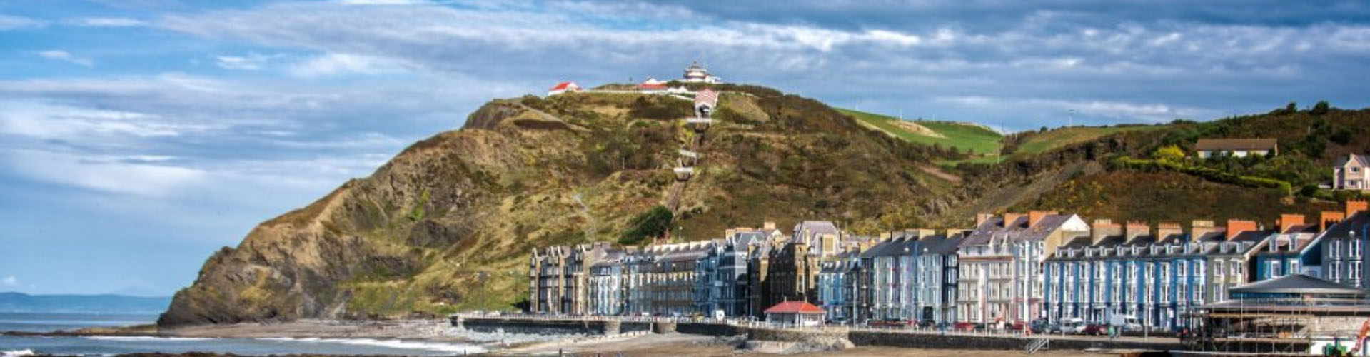 The Aberystwyth beach and promenade with the cliff railway behind