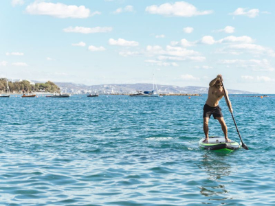 Man paddleboarding on the sea