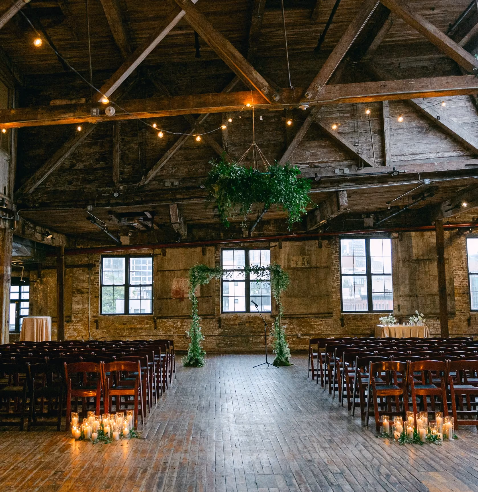 Greenpoint Loft Wedding Ceremony, floral arch and hanging greenery