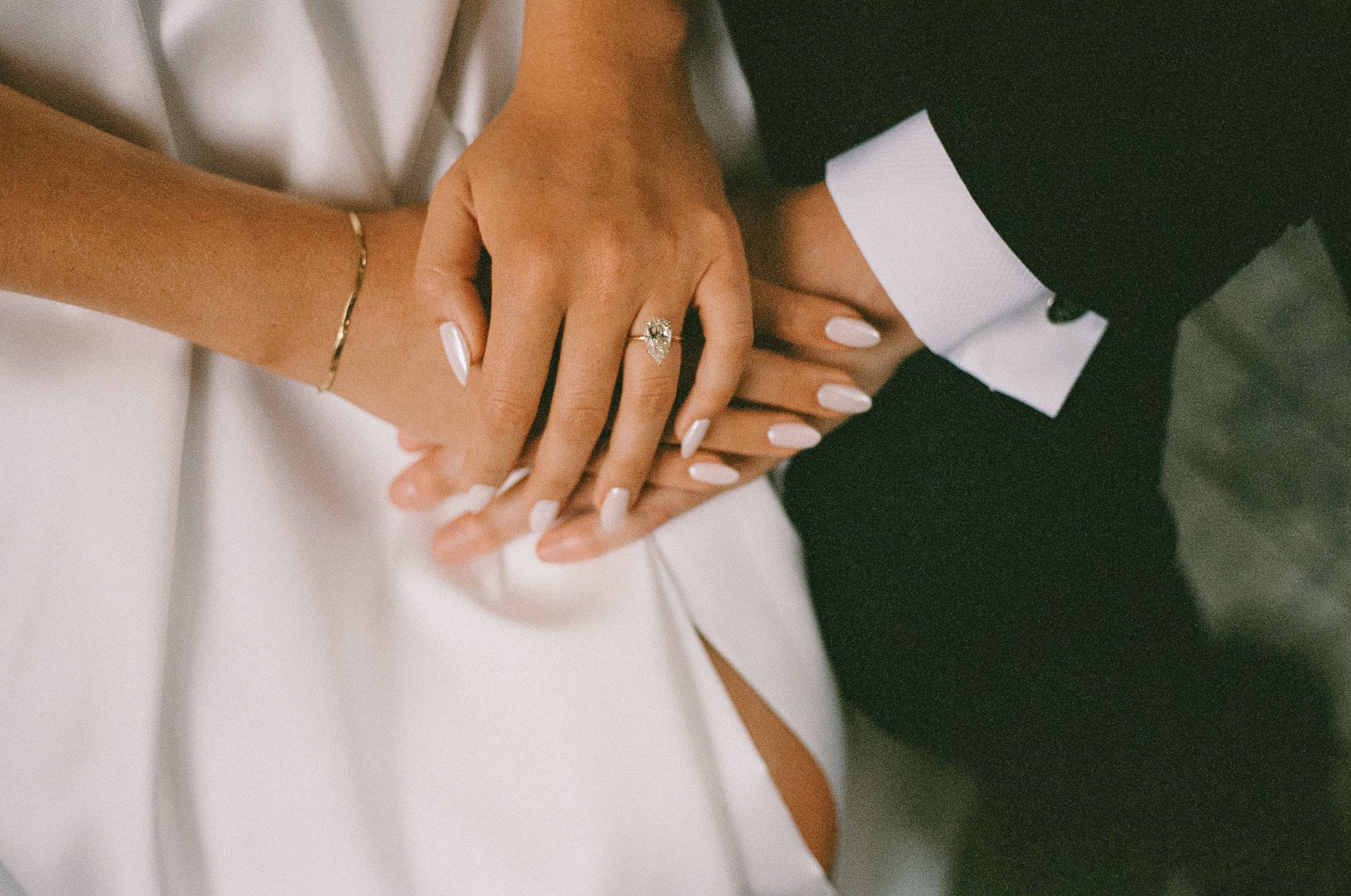 Bride and groom hands