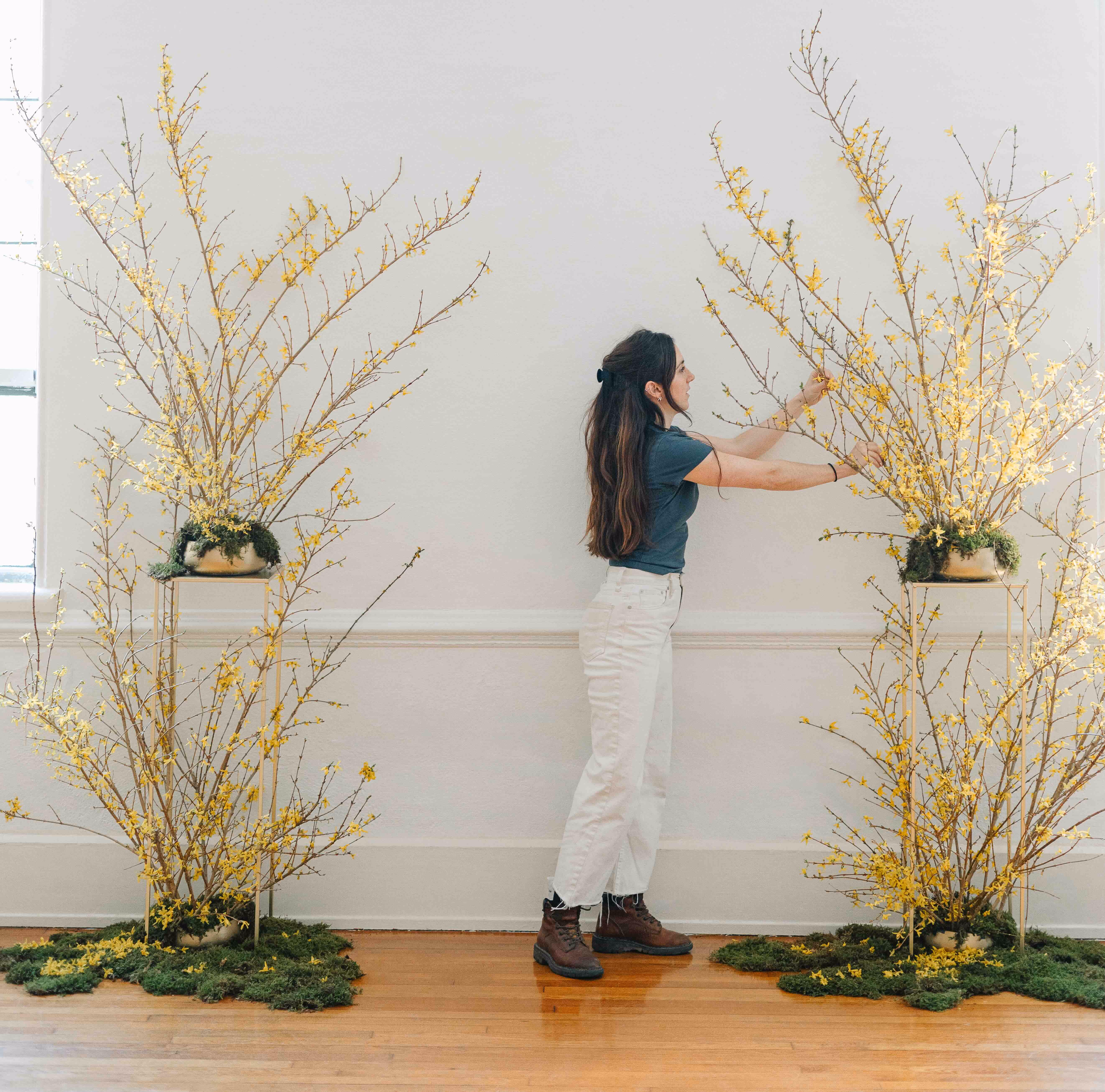 A girl making flower arrangements
