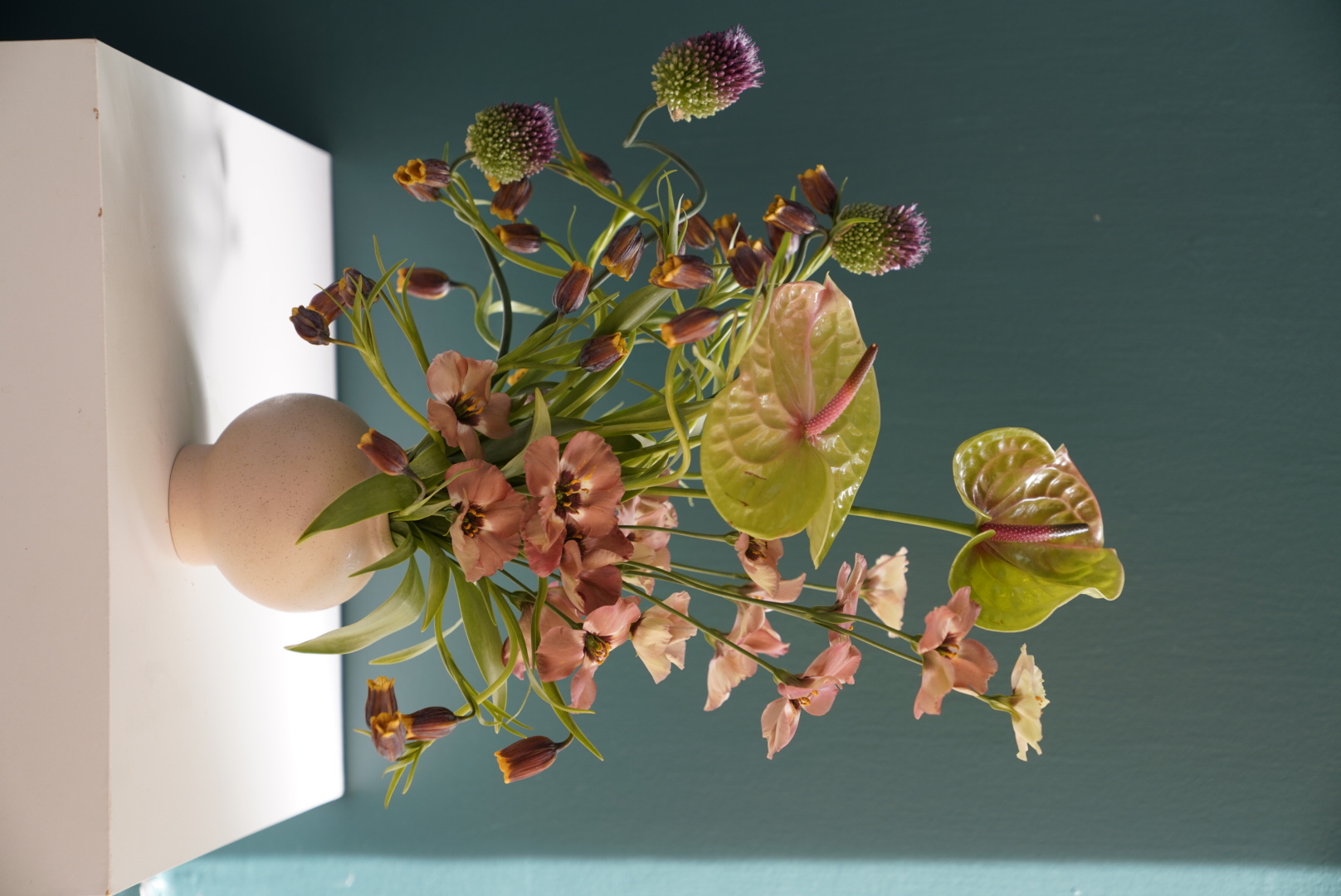 small pansy and allium arrangement