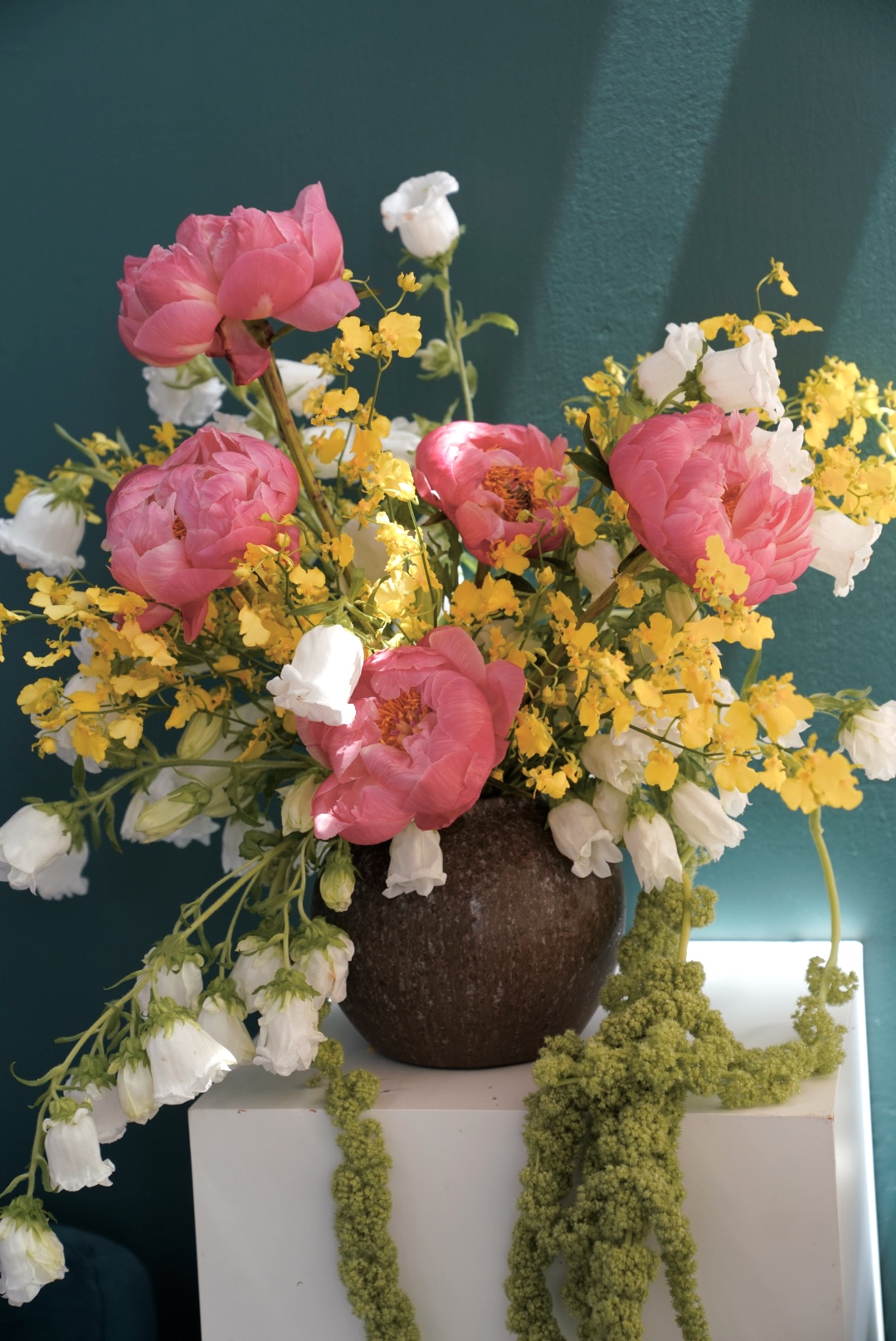 White lily of the valley bouquet in a clear glass vase