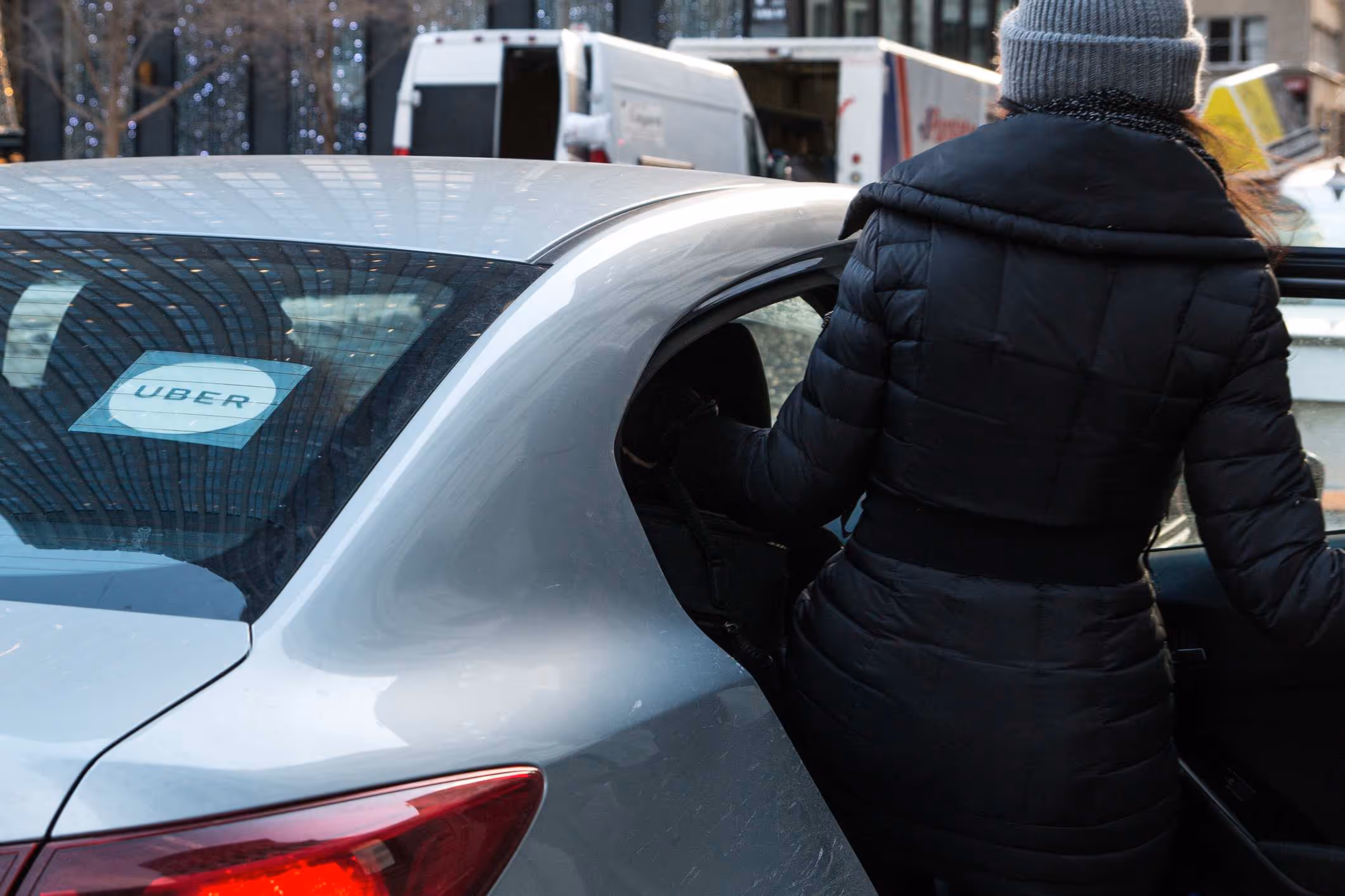 Woman about to take an Uber ride, representing Uber sexual assault lawsuit settlement amounts.