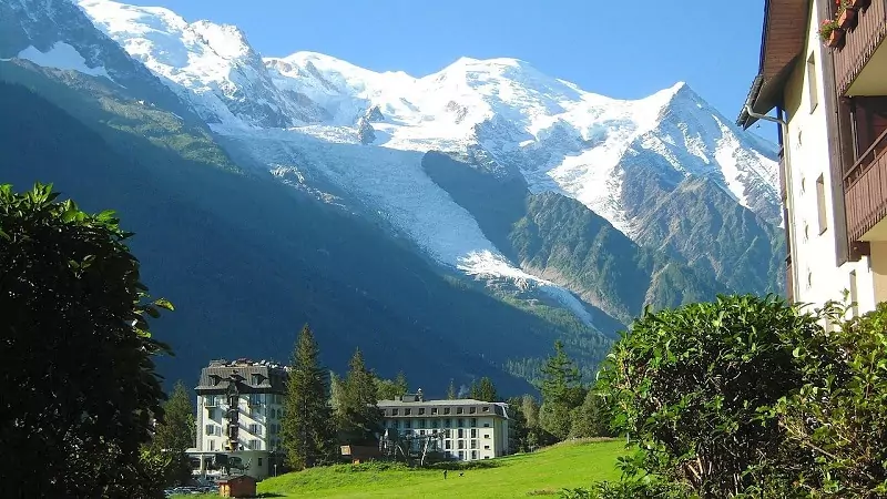 A valley in the French Alps with Mont-Blanc in the background.