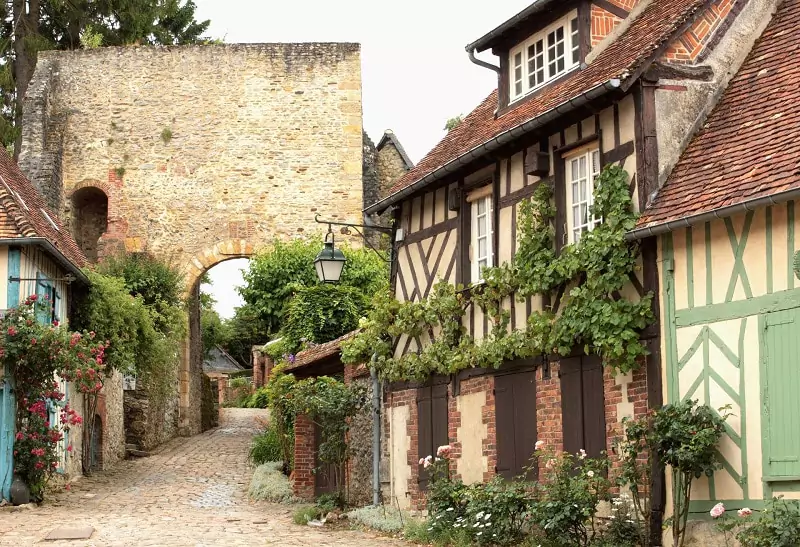 Remains of the castle's wall in a cobbled street of Gerberoy.