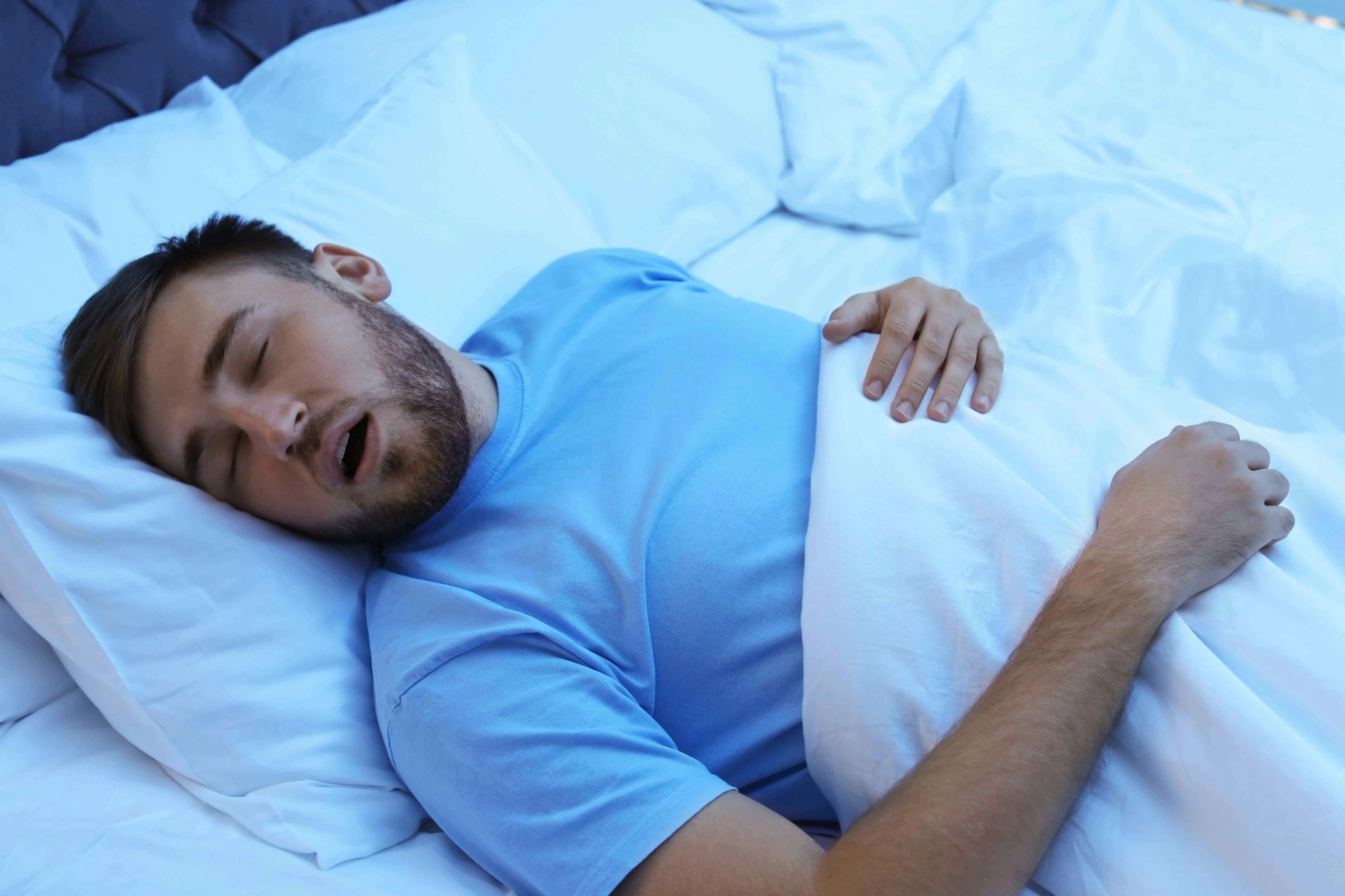 Dentist explaining sleep apnea and snoring treatment options in Poway