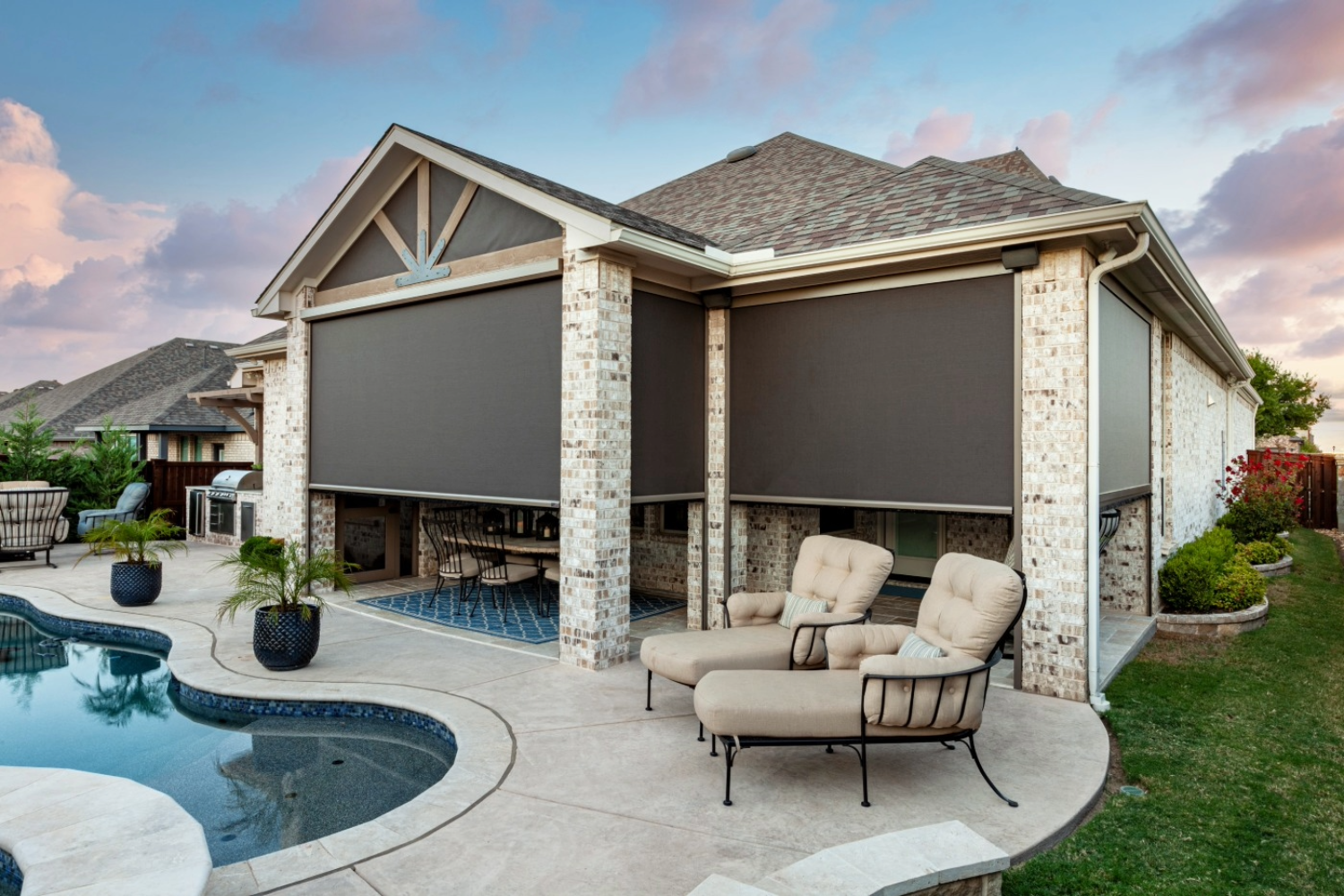 Outdoor retractable shades on a patio in DFW.