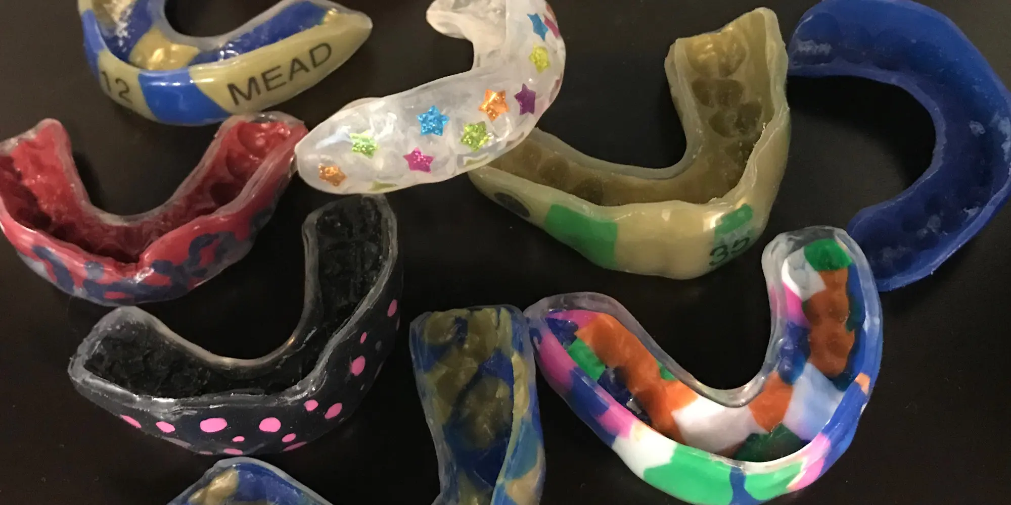 Fall Sports & Dental Safety: Why a Custom Mouthguard Matters More Than You Think