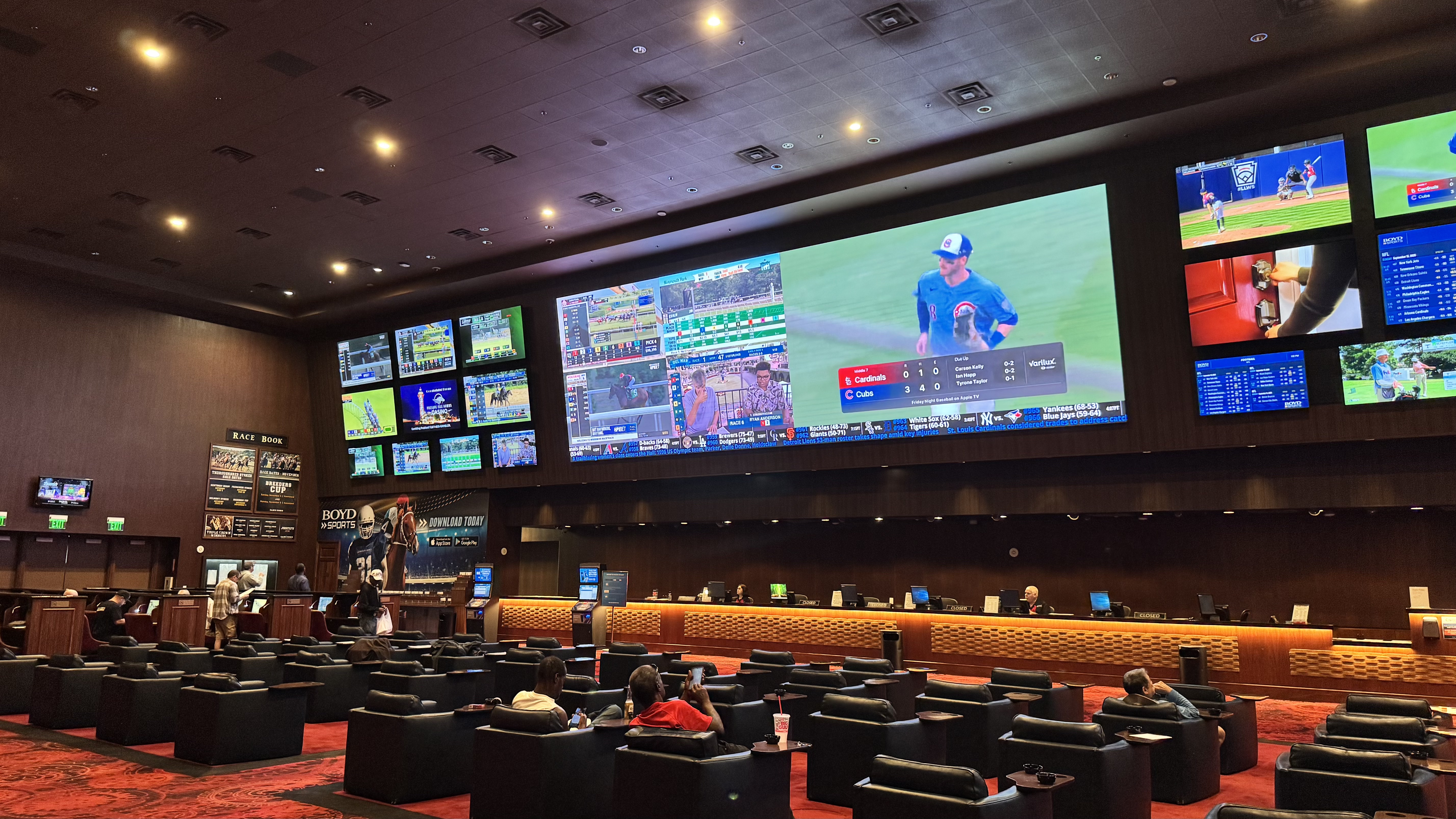 Sam's Town sportsbook after the remodel — one continuous LED wall running on LUCI