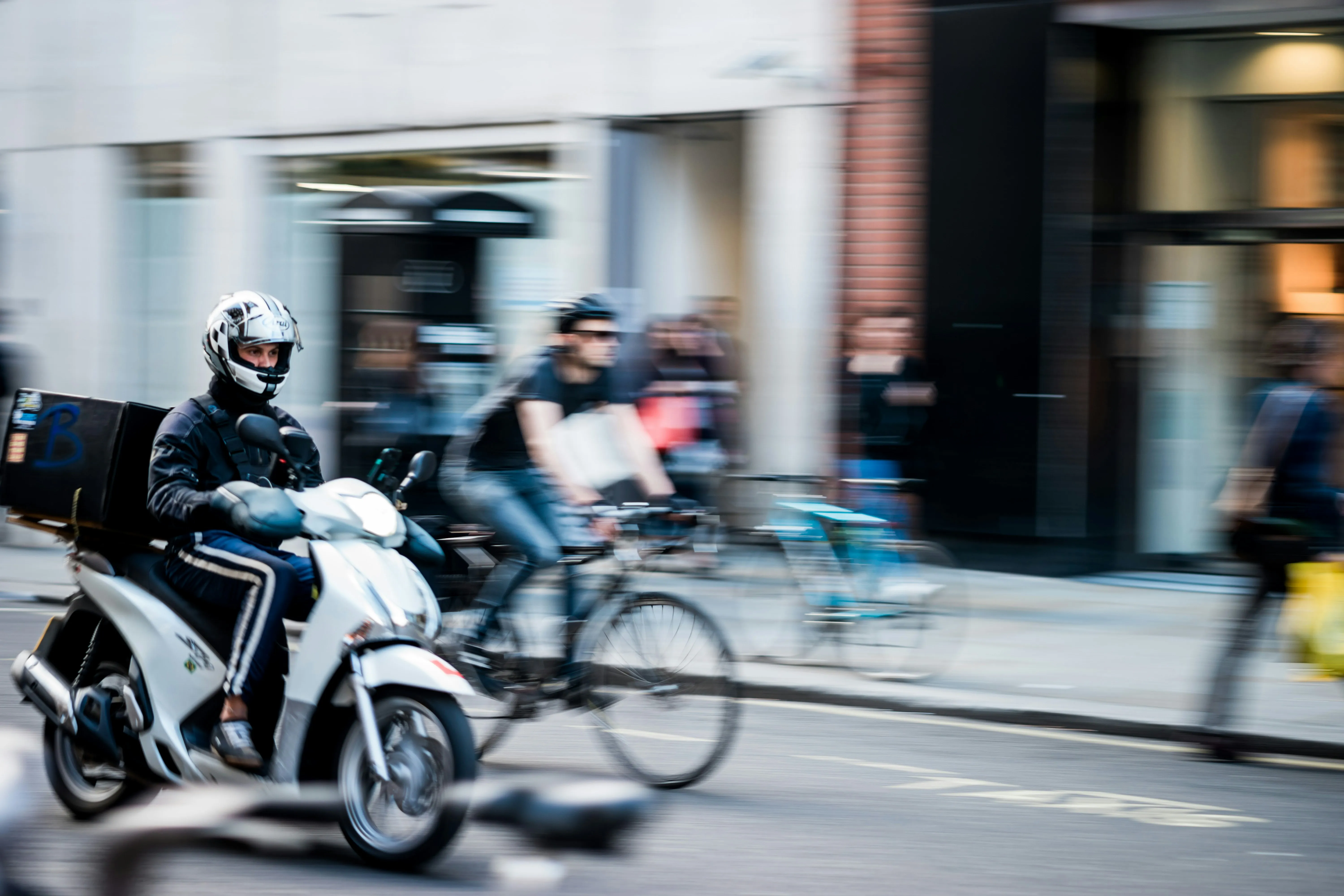 Delivery rider on motorbike