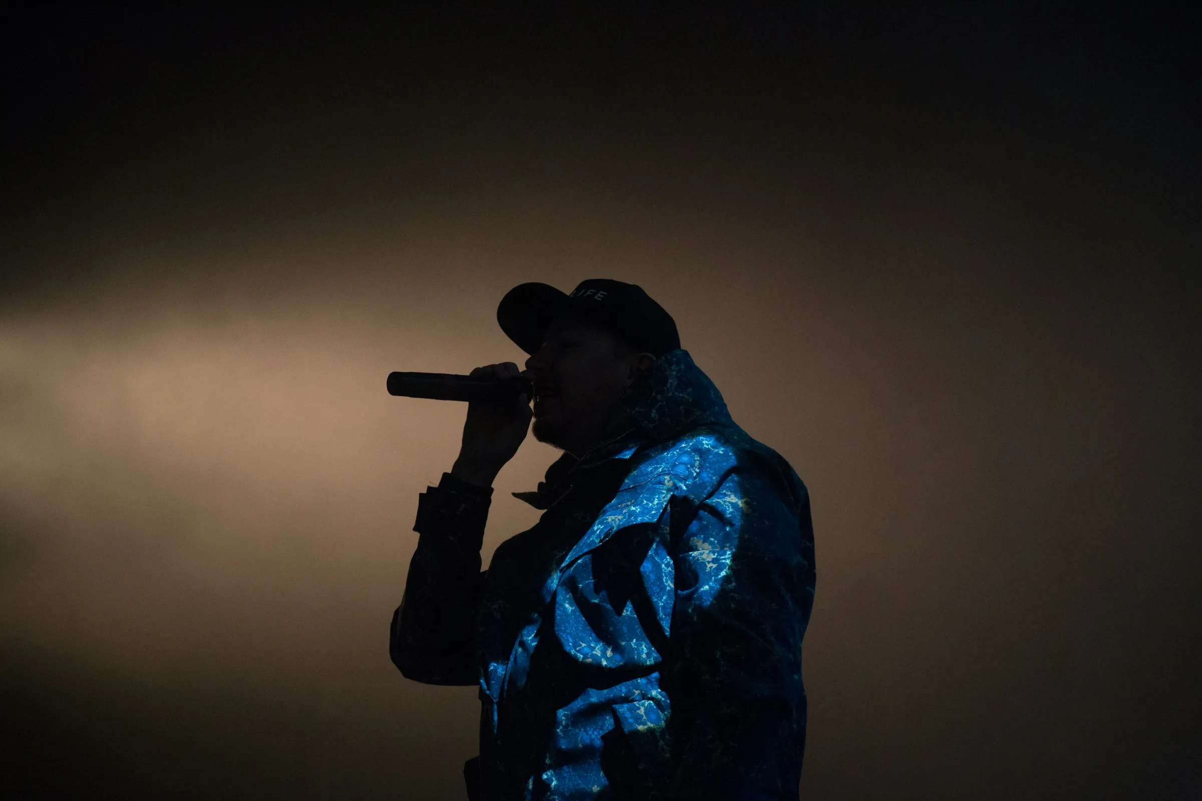 Silhouette of rapper performing