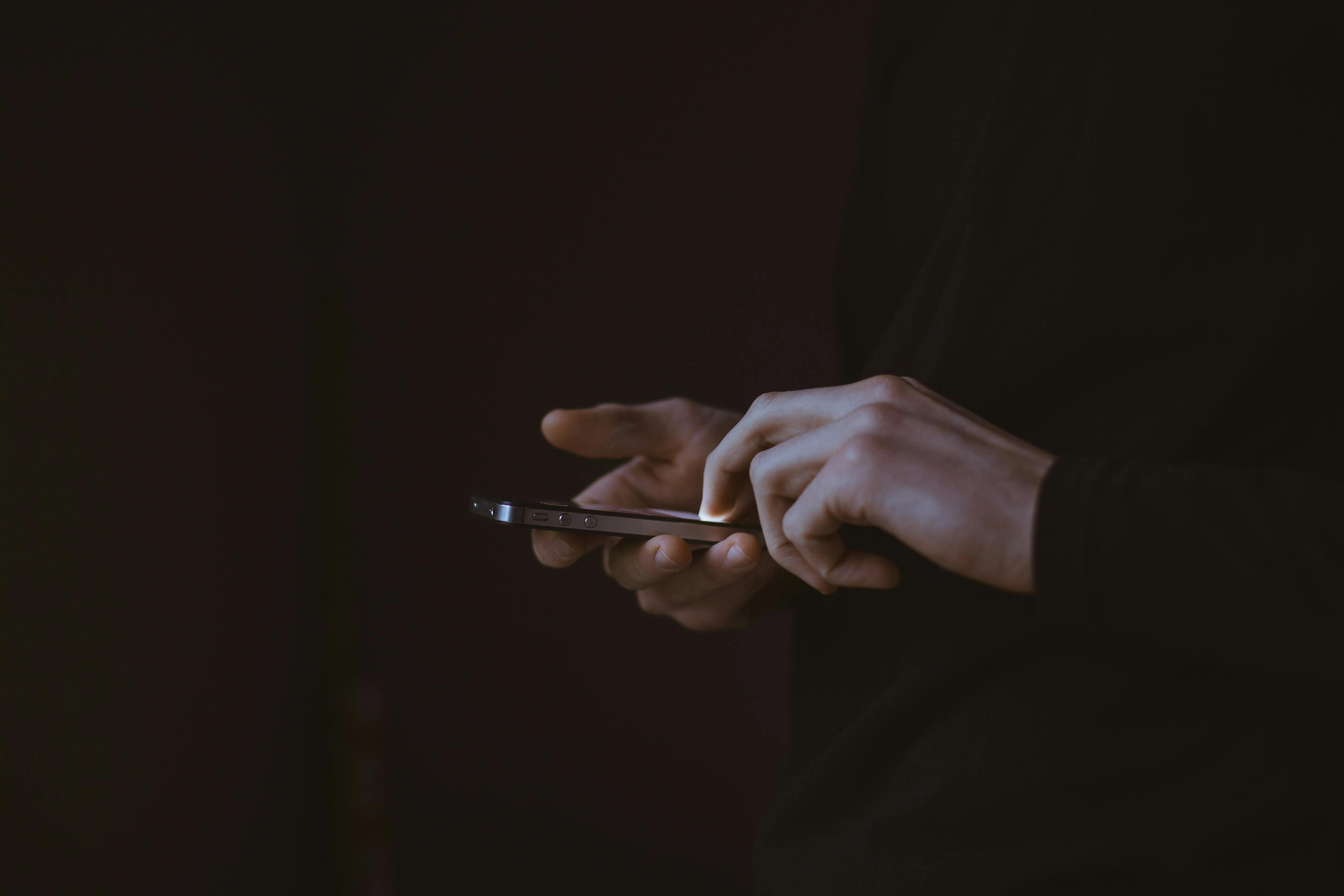 Person messaging on iPhone