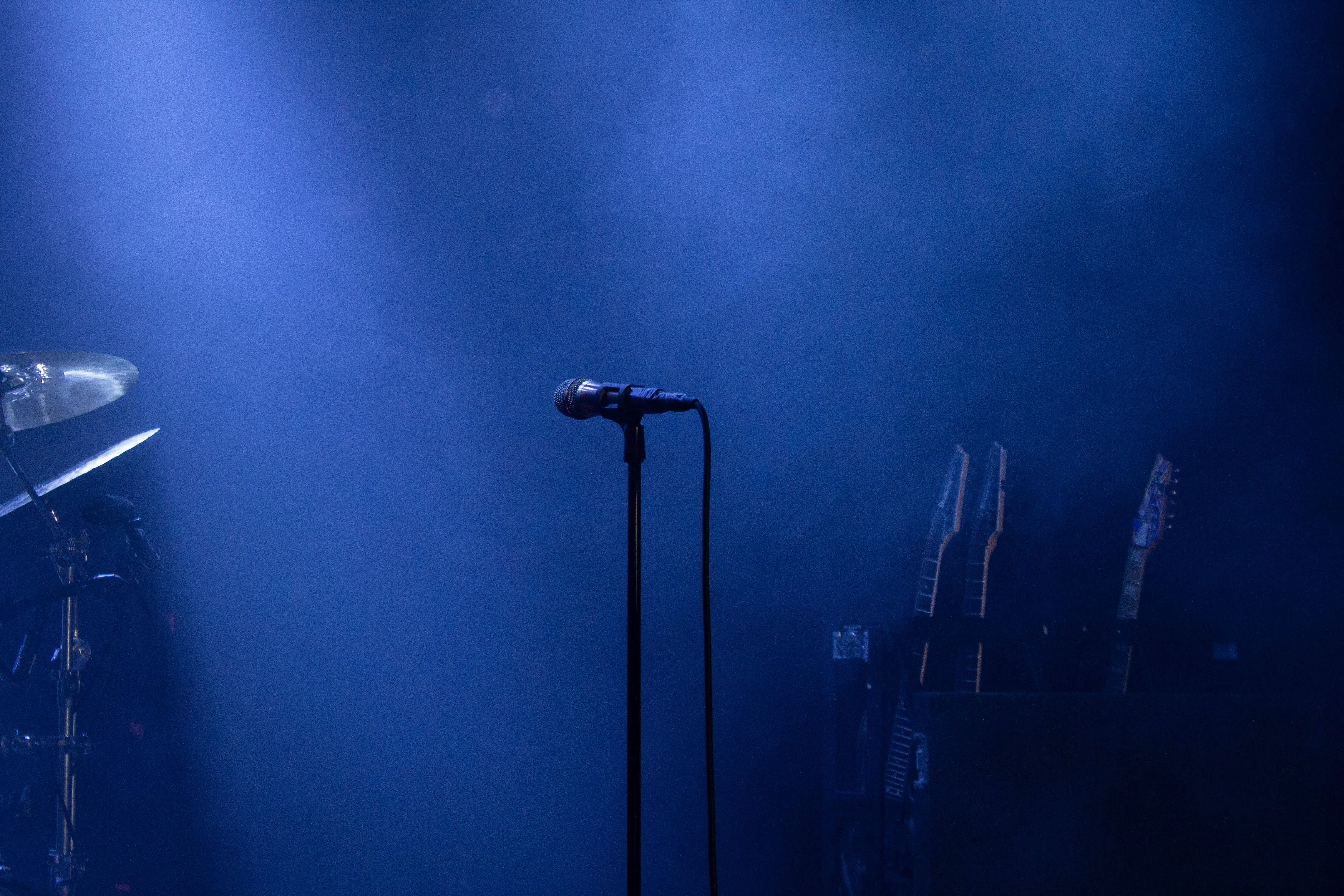 Black microphone on stand on stage