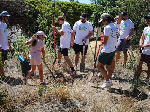 volunteer digging and planting