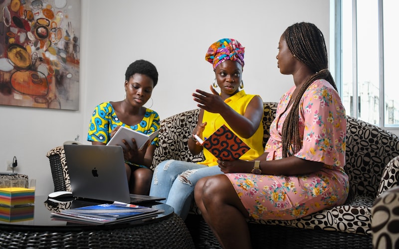Family gathering around a table with financial documents - TOSI planning