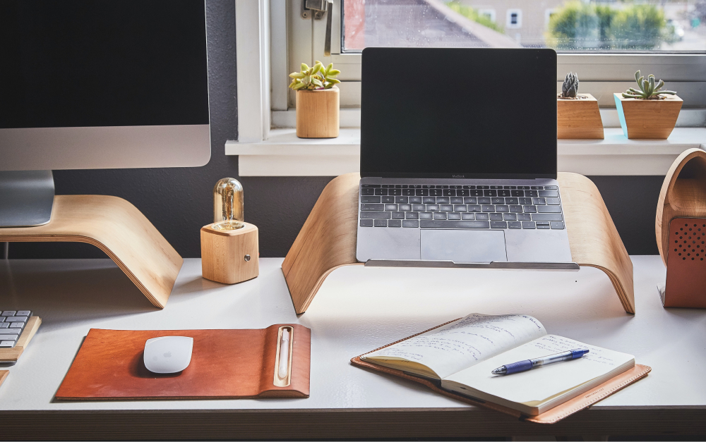 A notebook on a tidy desk where a team writes down the rules an agent should follow