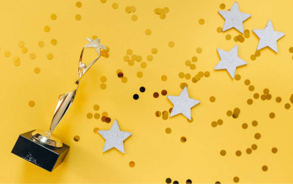 Team celebrating a successful project completion and client handover