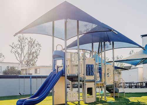 Commercial Sail Shades Over Chairs