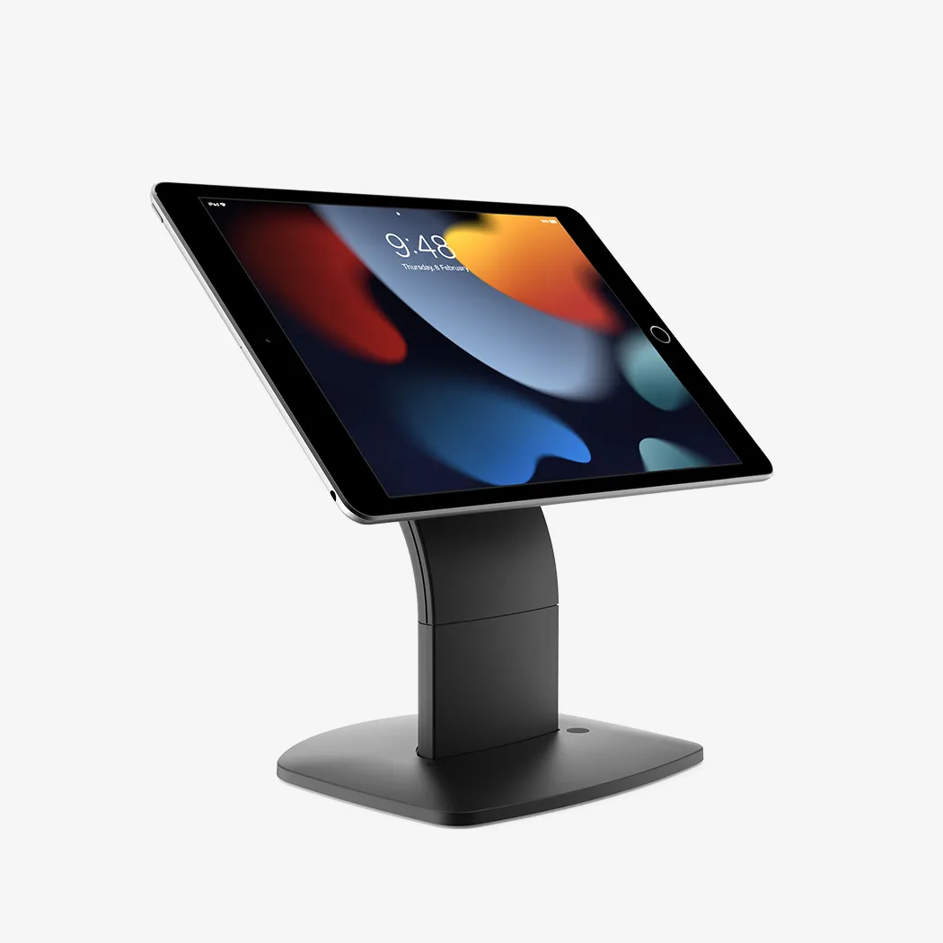 Black adjustable stand holding a tablet displaying an abstract colorful wallpaper and time 9:48.