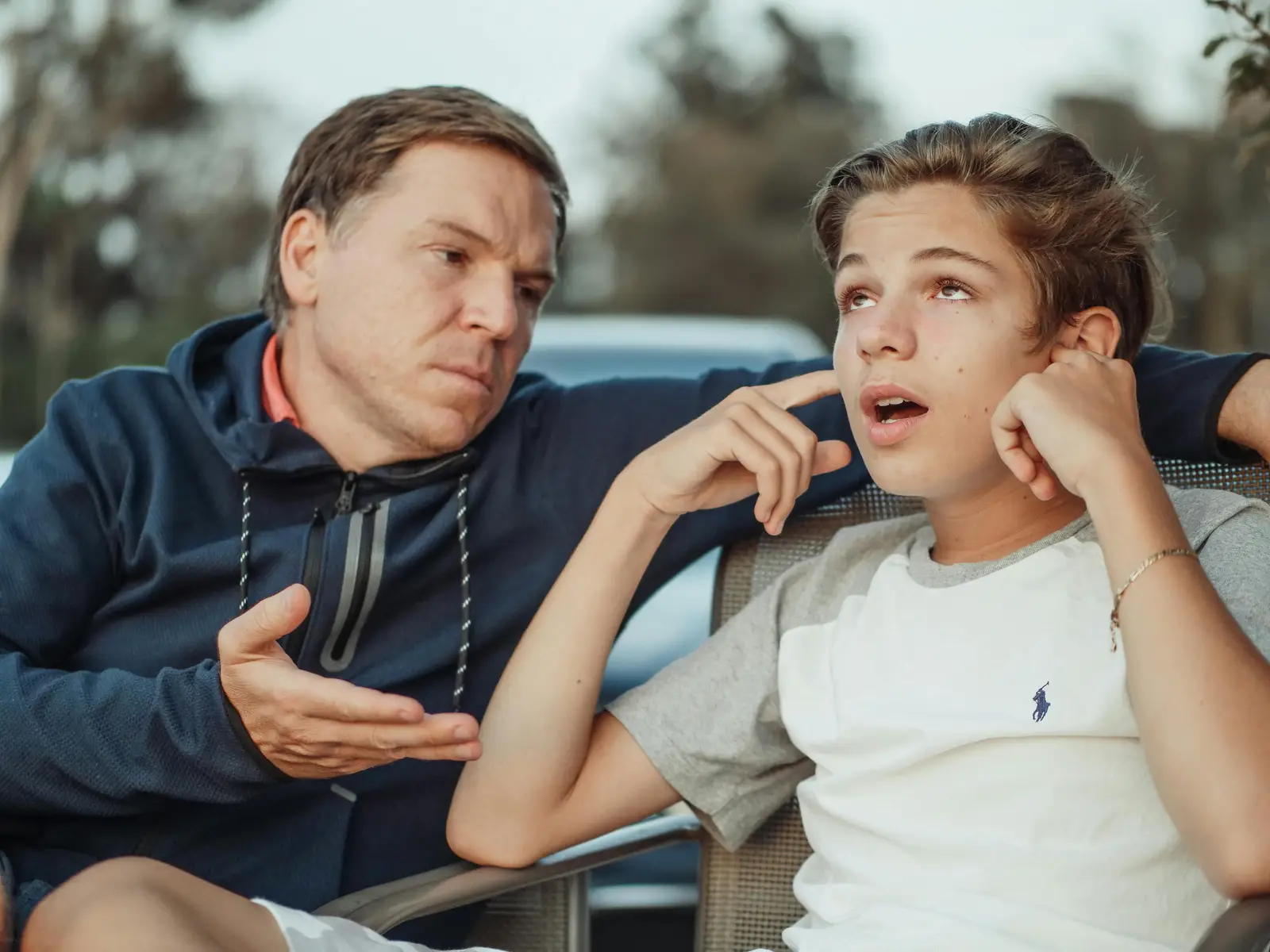 A father struggling to communicate with their teenage son