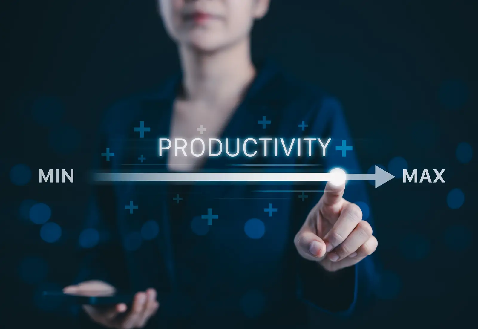 picture of a business woman drawing with the finger a line from minimum towards maximum, suggesting increased productivity