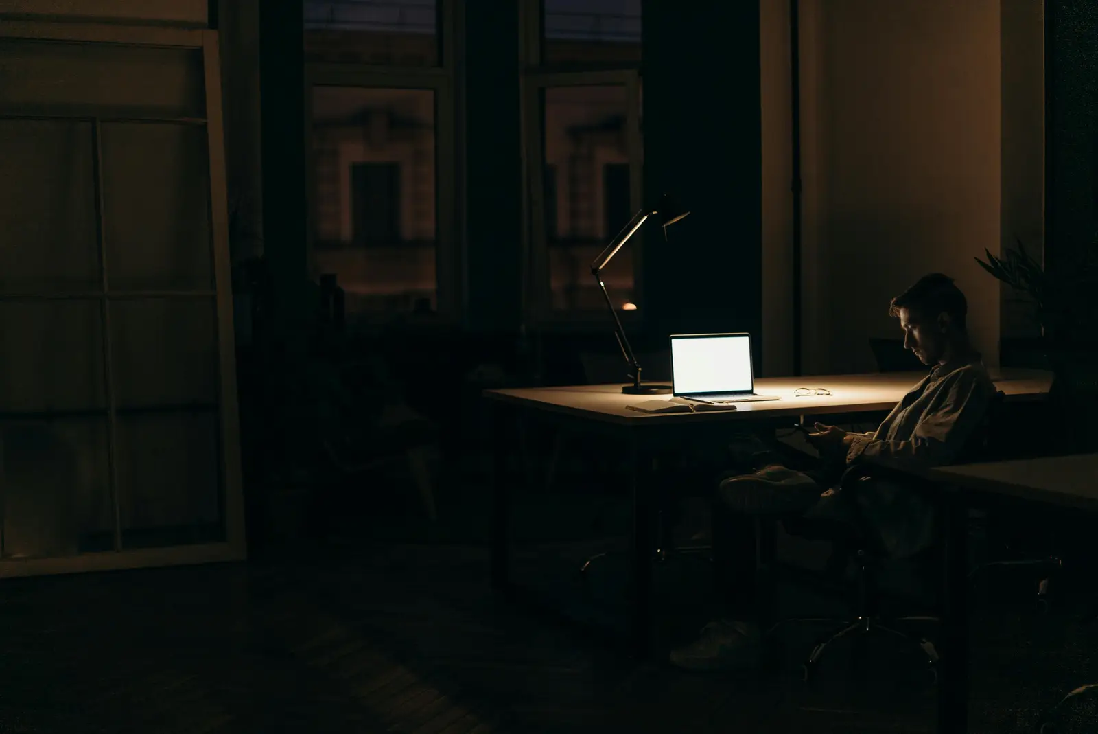 picture of a businessman working late at night
