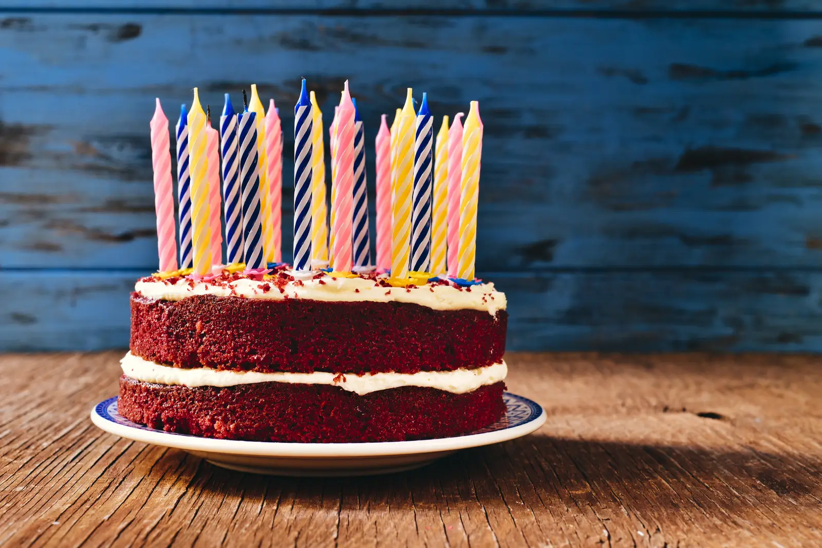 A poignant image of a birthday cake with its candles unlit, symbolizing the quiet disappointment and hurt felt when a cherished family anniversary is forgotten.