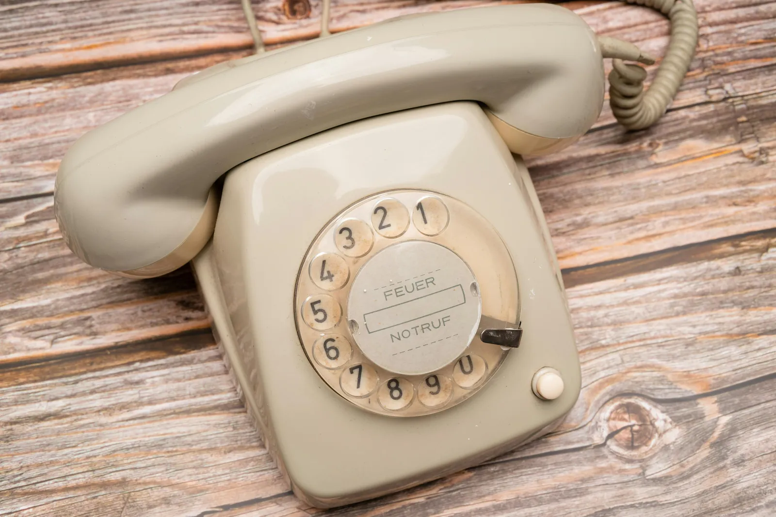 Picture of an analogue household phone likely from the 1970s. Suggesting the importance of utilising less the mobile phone devices.