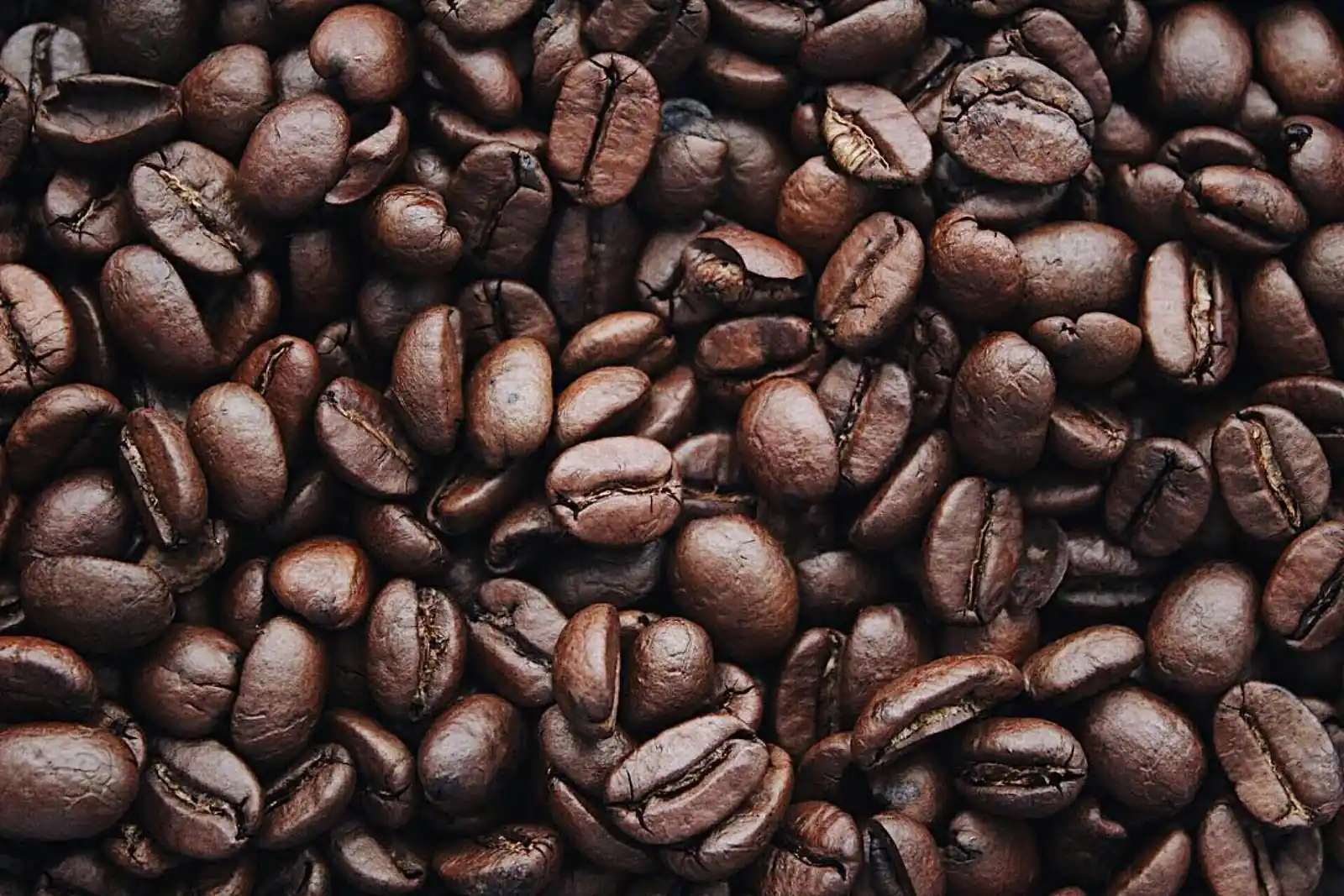 picture of coffee beans suggesting in this context of the blog the use of caffeine, mechanisms and side-effects.