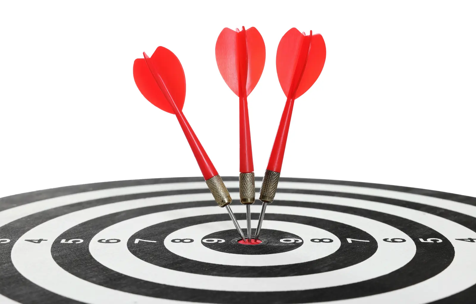 Targeting. Dart board with arrows isolated on white suggesting the importance of an accurate and comprehensive ADHD assessment.