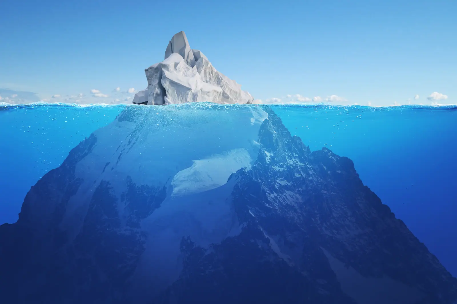 picture of an iceberg, in this context explaining the hidden struggles of the individual with ADHD appearing at the surface to function well, while internally struggling.
