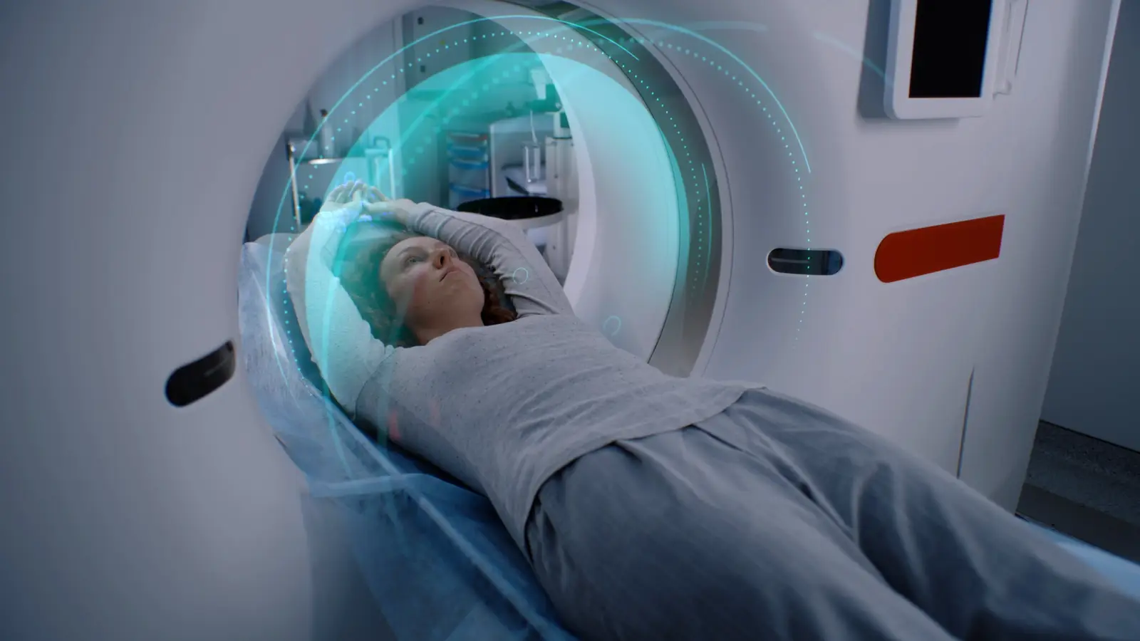 picture of a woman going through an MRI test for screening and prevention.