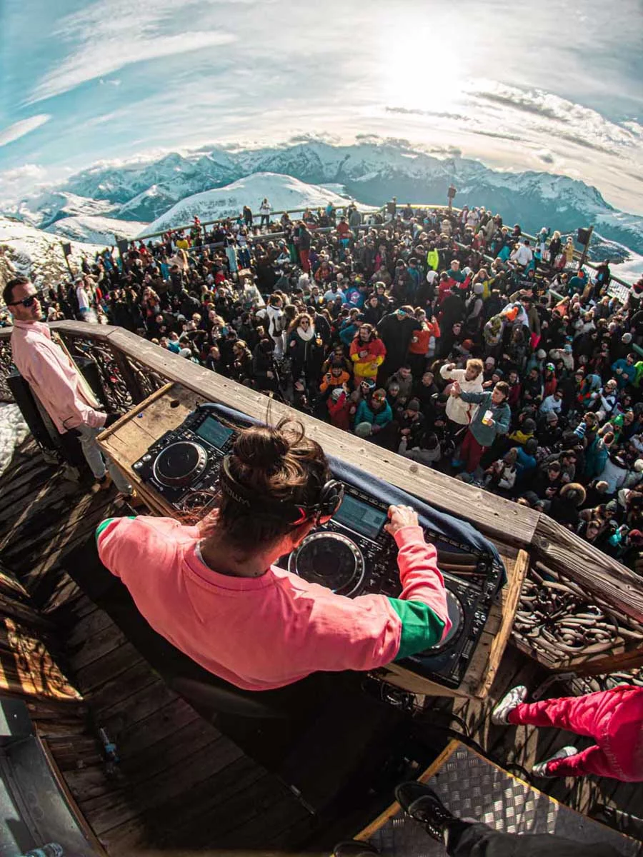 Folie Douce après-ski bar in French Alps showcasing exceptional brand experience and hospitality with DJ performance