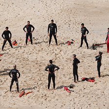 Humans standing around in a circle