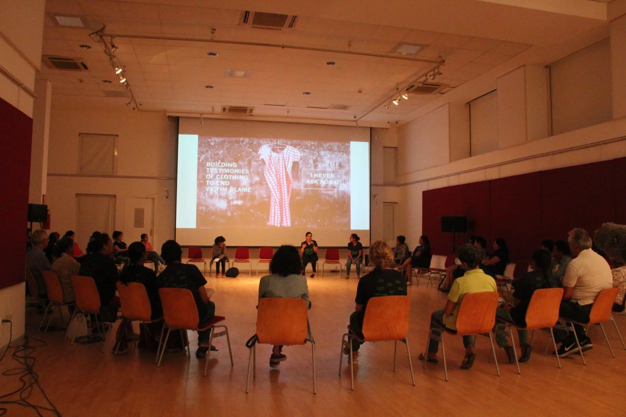 Group of employees sitting in a circle during a workplace discussion session focused on mental health awareness and open conversations