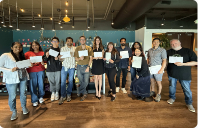 Volunteers holding their finished letters together