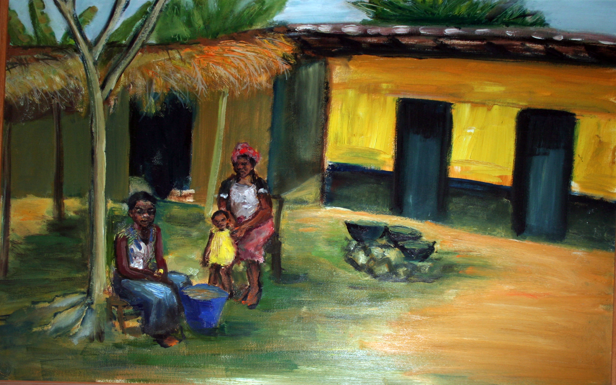 Afrika vrouwen zittend voor hun huis