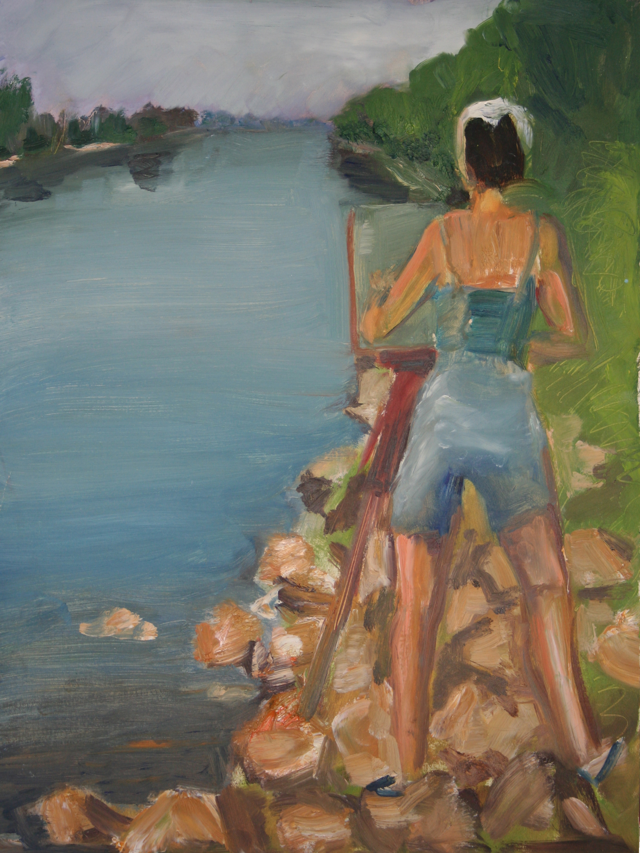 Vrouw schilderend langs een rivier