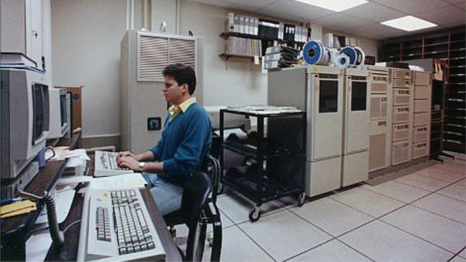 A boring mundane office computer room from the 80s.
